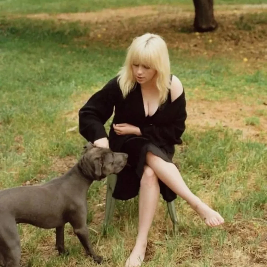 Billie Eilish Feet Barefoot In Garden With Dog Pic